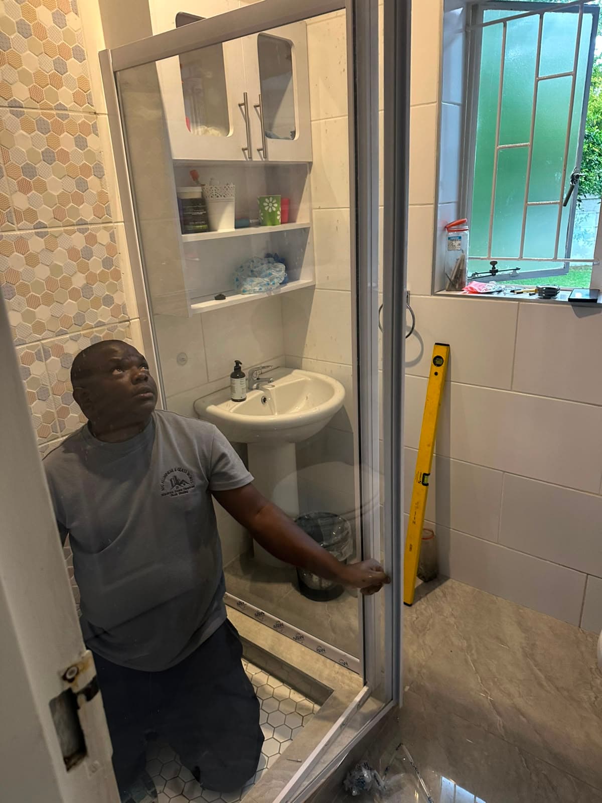 Aluminium Pivot Shower Door Replacement project photo 3