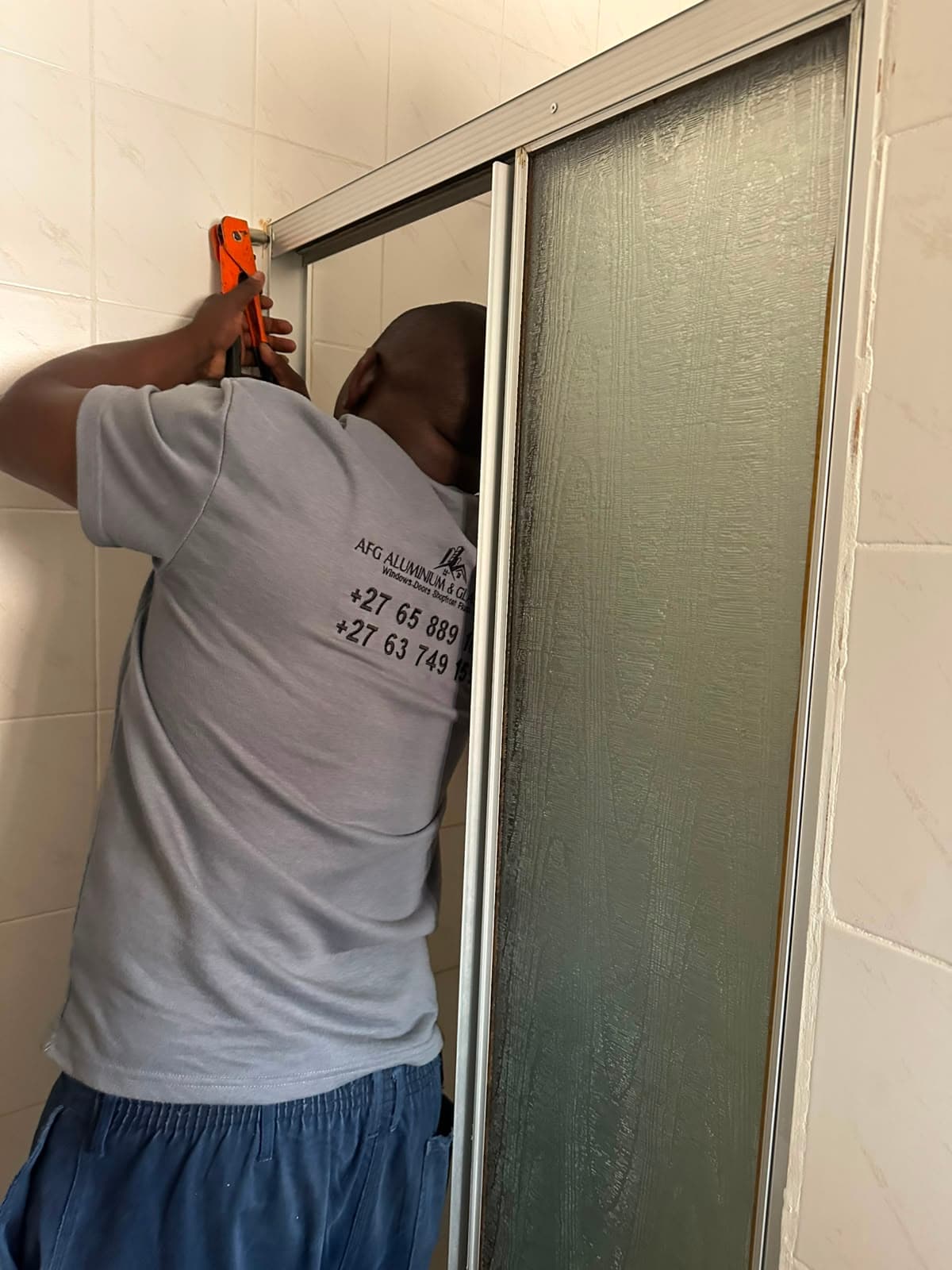 Aluminium Pivot Shower Door Replacement project photo 6